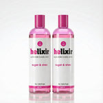 Two bottles of helixir sugar & shea elixir on a white background