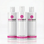 Three bottles of Lubricunt on a white background